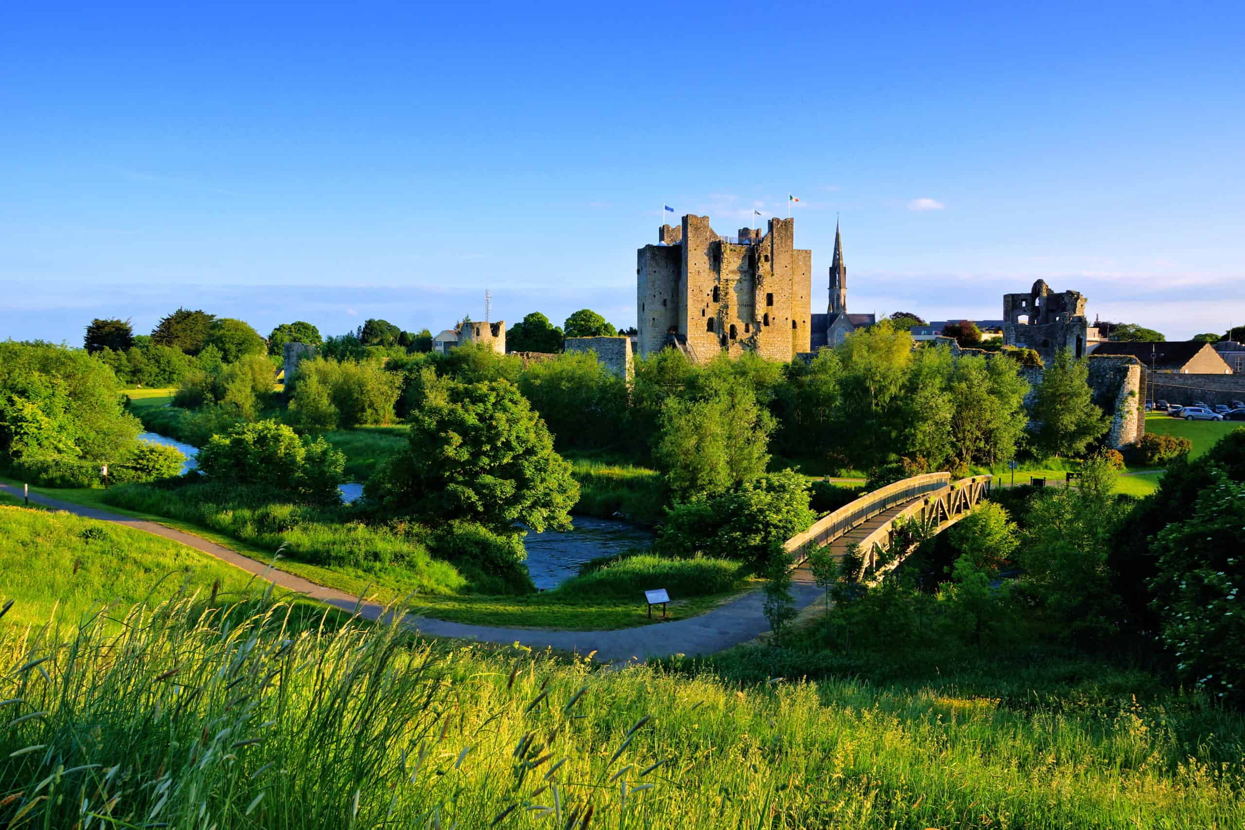Historic Trim Castle with foot bridge. Late day light, County Meath, Ireland